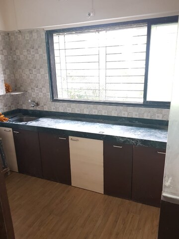 Kitchen in 2 BHK Apartment at New Dev Ashish CHS Lousi Wadi, Louis Wadi – for Rent