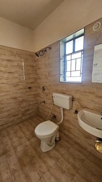 Bathroom in 1 BHK Apartment at DSK Meghmalhar Phase I, Sinhagad Road – for Rent