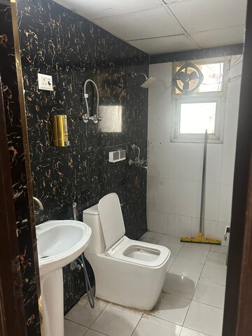 Bathroom in 3 BHK Apartment at Ajnara Gen X, Dundahera – for Rent