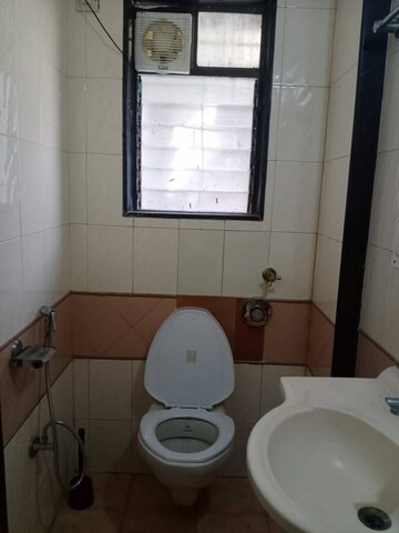 Bathroom in 3 BHK Apartment at Agarwal Vrindavan Gardens, Vasai East – for Rent