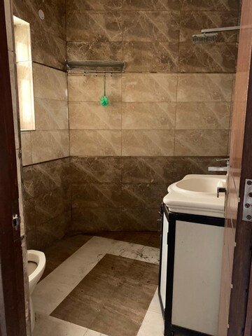 Bathroom in 3 BHK Builder Floor at Malviya Nagar – for Sale