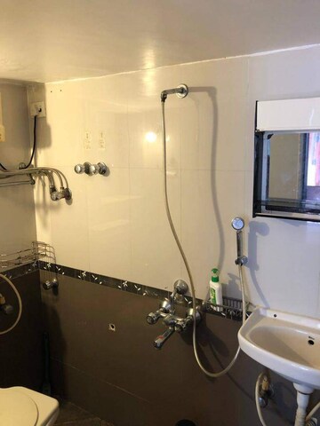 Bathroom in 1 BHK Apartment at Real Emporium, Vasai East – for Sale