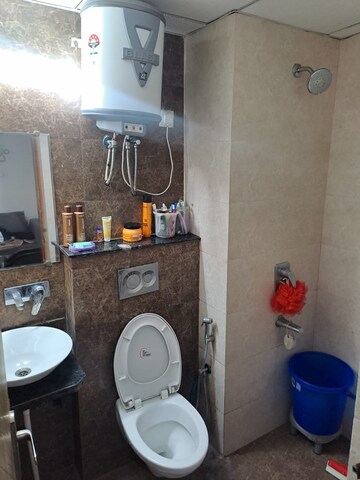 Bathroom in 4 BHK Apartment at Sushma Crescent, Dhakoli Village – for Rent