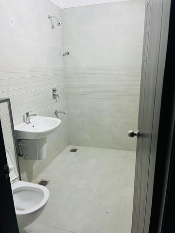 Bathroom in 3 BHK Apartment at Sushma Crescent, Dhakoli Village – for Rent