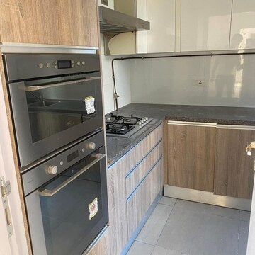 Kitchen in 3 BHK Apartment at DLF The Primus, Sector 82a – for Rent