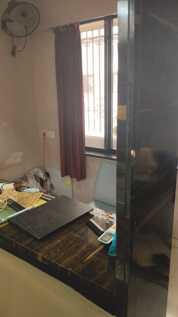 Living Room in 1 RK Apartment at Vile Parle East – for Sale