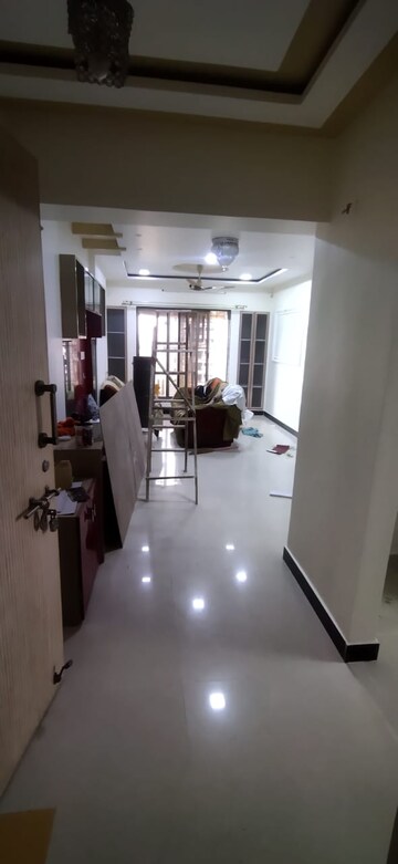 Living Room in 2 BHK Apartment at Cosmos Horizon, Kapur Bawdi – for Rent