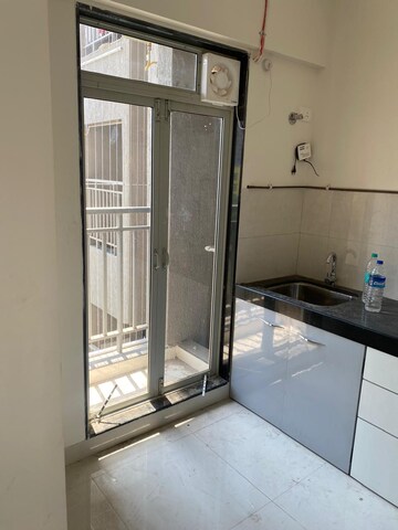 Kitchen in 2 BHK Apartment at Ashar Metro Towers, Vartak Nagar – for Rent