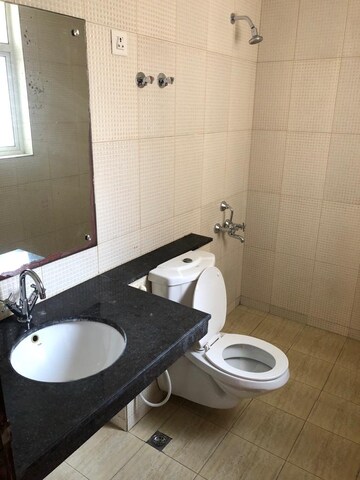 Bathroom in 4 BHK Apartment at Sunworld Vanalika, Sector 107 – for Rent