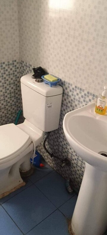 Bathroom in 3 BHK Apartment at Aims Golf City, Sector 75 – for Rent