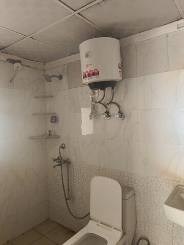 Bathroom in 3 BHK Apartment at Aims Golf City, Sector 75 – for Rent