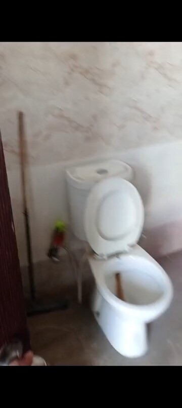 Bathroom in 2 BHK Apartment at Charms Castle, Raj Nagar Extension – for Sale