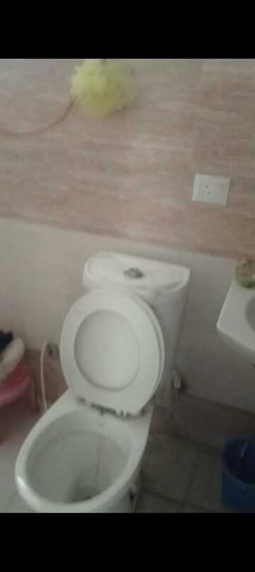 Bathroom in 2 BHK Apartment at Charms Castle, Raj Nagar Extension – for Sale