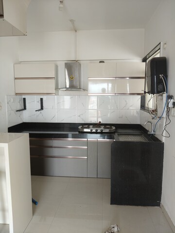 Kitchen in 2 BHK Apartment at Dynamic Oasis, Undri – for Sale