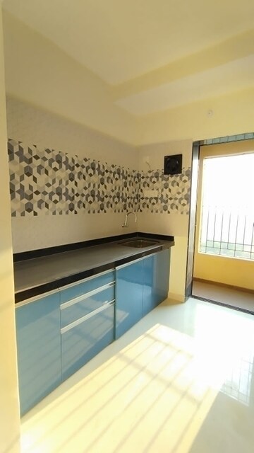 Kitchen in 2 BHK Apartment at Raunak City Sector 4, Kalyan West – for Sale