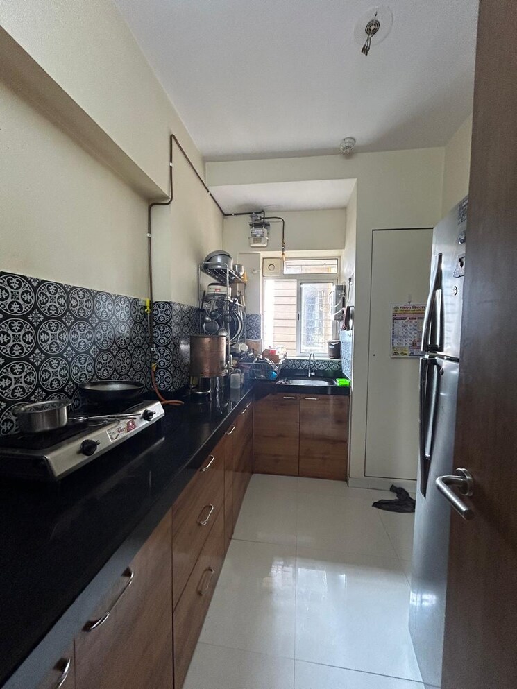 Kitchen, lodha-amara 2 Bedroom 672 Sq.Ft. Apartment In Kolshet Road Thane 7893440