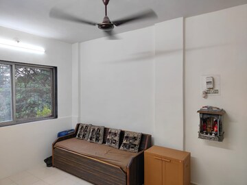 Living Room in 1 BHK Apartment at Abhiyanta CHS, Sanpada – for Sale