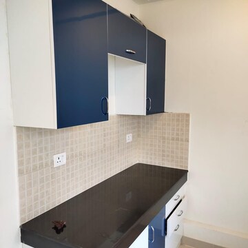 Kitchen in 2 BHK Apartment at Godrej Meridien, Sector 106 – for Rent