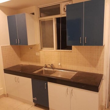 Kitchen in 2 BHK Apartment at Godrej Meridien, Sector 106 – for Rent