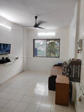 Living Room in 1 BHK Apartment at Abhiyanta CHS, Sanpada – for Sale