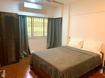 Bedroom in 2 BHK Apartment at Casa Maria Apartment, Bandra West – for Rent