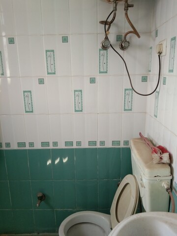 Bathroom in 2 BHK Apartment at Alkapuri – for Rent