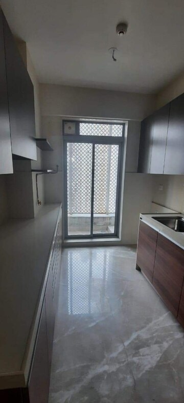 Kitchen in 3 BHK Apartment at Piramal Vaikunth, Balkum Pada – for Rent