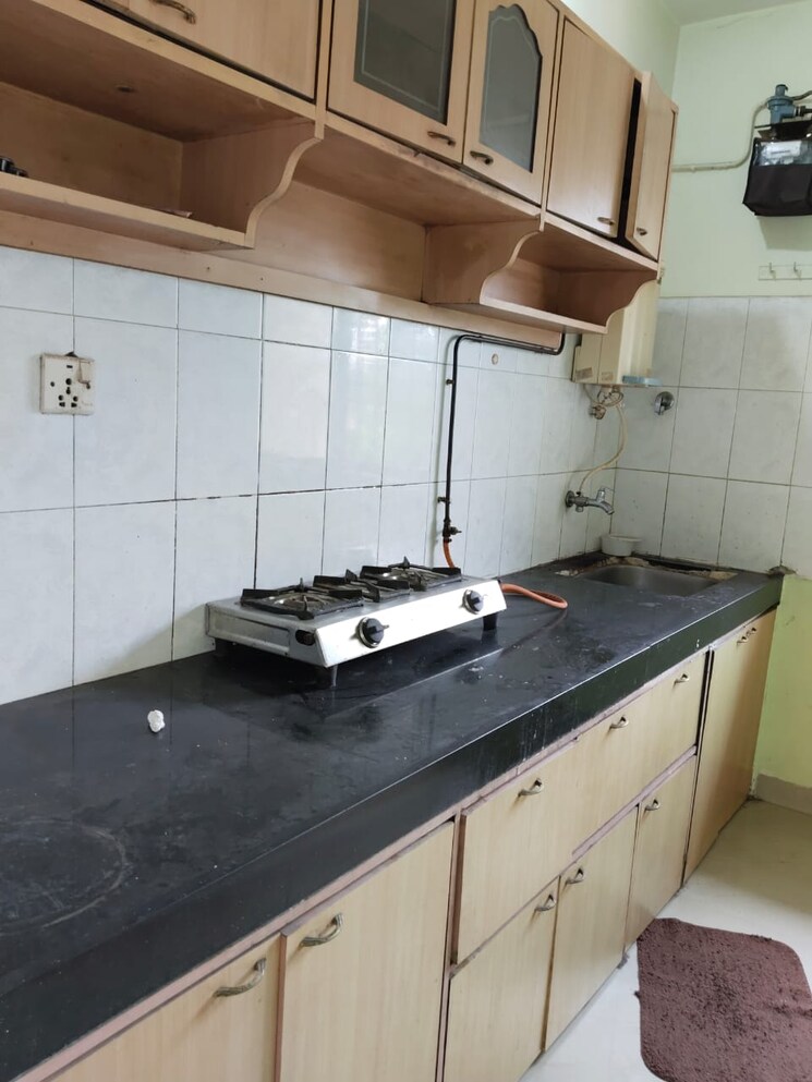 Kitchen, happy-valley 1 Bedroom 450 Sq.Ft. Apartment In Manpada Thane 7894351