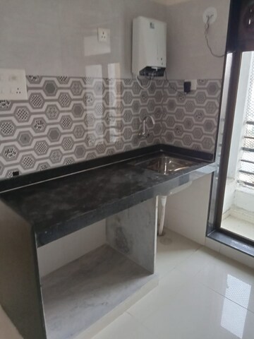 Kitchen in 2 BHK Apartment at Sanghvi S3 Skyrise, Mira Road – for Sale