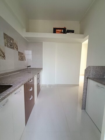 Kitchen in 1 BHK Apartment at Rutu Riverview Classic, Kalyan West – for Rent