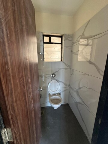 Bathroom in 1 BHK Apartment at Raunak City, Kalyan West – for Sale