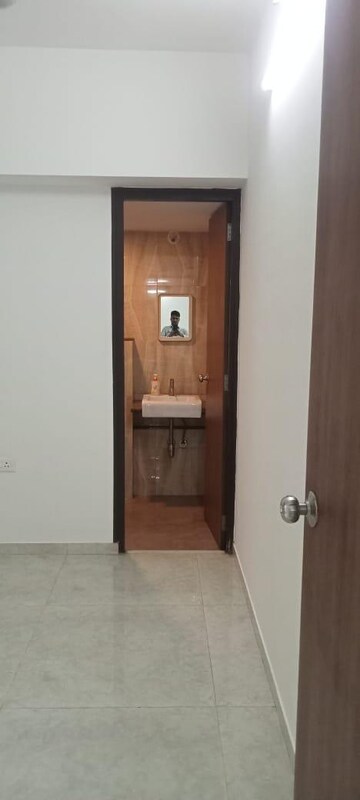 Room in 2 BHK Apartment at Harmony Signature Towers, Owale – for Rent