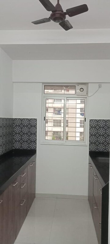 Staircase in 2 BHK Apartment at Harmony Signature Towers, Owale – for Rent