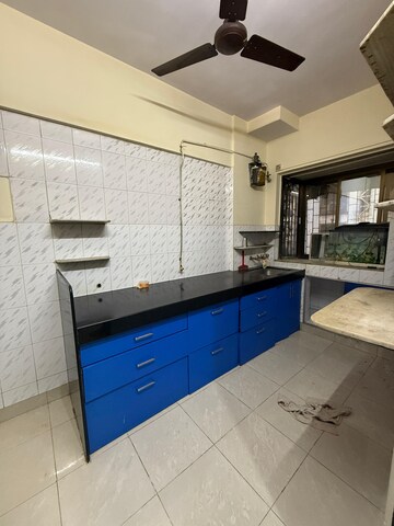 Kitchen in 1 BHK Apartment at Om Krishna CHS, Dahisar East – for Sale