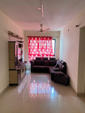 Living Room in 1 BHK Apartment at Lodha Crown Quality Homes Dombivli, Dombivli East – for Rent
