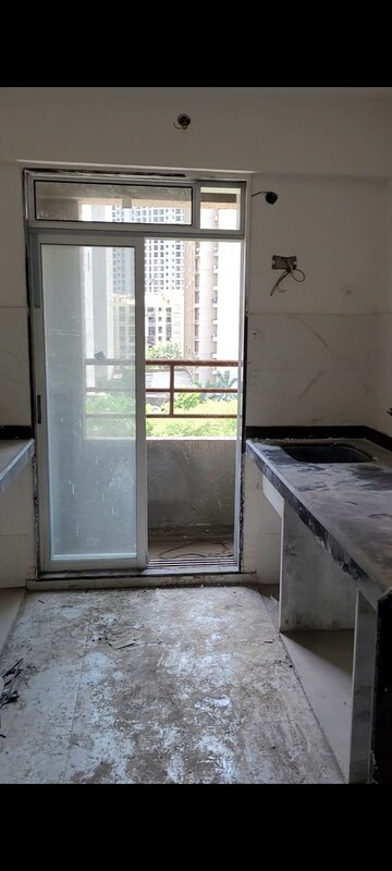 Kitchen in 2 BHK Apartment at Mahavir Kalpavruksha, Ghodbunder Road – for Sale