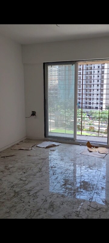 Room in 2 BHK Apartment at Mahavir Kalpavruksha, Ghodbunder Road – for Sale