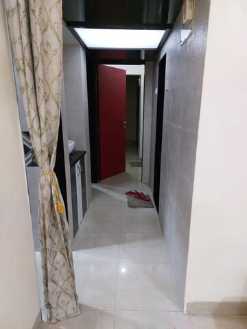 Building Lobby in 2 BHK Apartment at Rutu Estate, Brahmand – for Sale