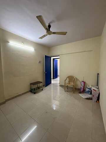 Living Room in 1 BHK Apartment at Om Krishna CHS, Dahisar East – for Sale