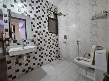 Bathroom in 2 BHK Builder Floor at Chattarpur – for Rent