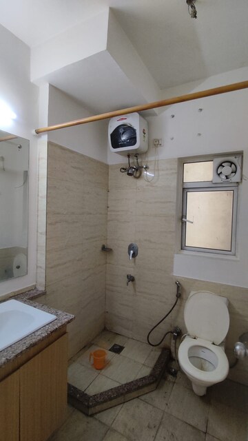 Bathroom in 3 BHK Apartment at Moti Nagar – for Sale