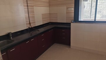 Kitchen in 2 BHK Apartment at Prathamesh Hills CHS, Dhokali – for Rent