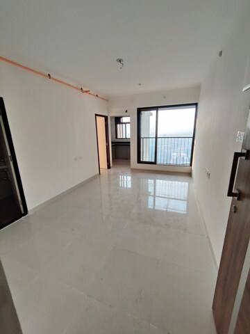 Living Room in 1 BHK Apartment at Chandak Nishchay, Borivali East – for Sale