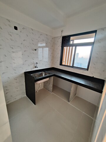 Kitchen in 1 BHK Apartment at Chandak Nishchay, Borivali East – for Sale