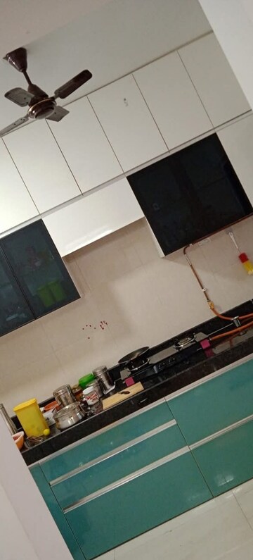 Kitchen in 2 BHK Apartment at Cosmos Habitat, Majiwada – for Rent