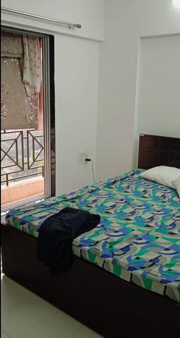 Bedroom in 2 BHK Apartment at Cosmos Habitat, Majiwada – for Rent