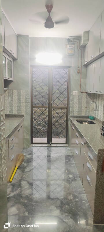 Kitchen in 3 BHK Apartment at Raunak Tower, Pokhran Road No 1 – for Rent