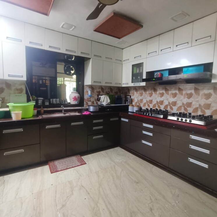 Kitchen, yari road 6 Bedroom 3500 Sq.Ft. Independent House In Yari Road Mumbai 7897429