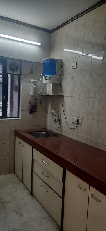 Kitchen in 2 BHK Apartment at Meera CHS, Andheri West – for Rent