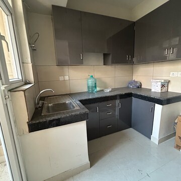 Kitchen in 2 BHK Apartment at Tata Eureka Park, Sector 150 – for Rent